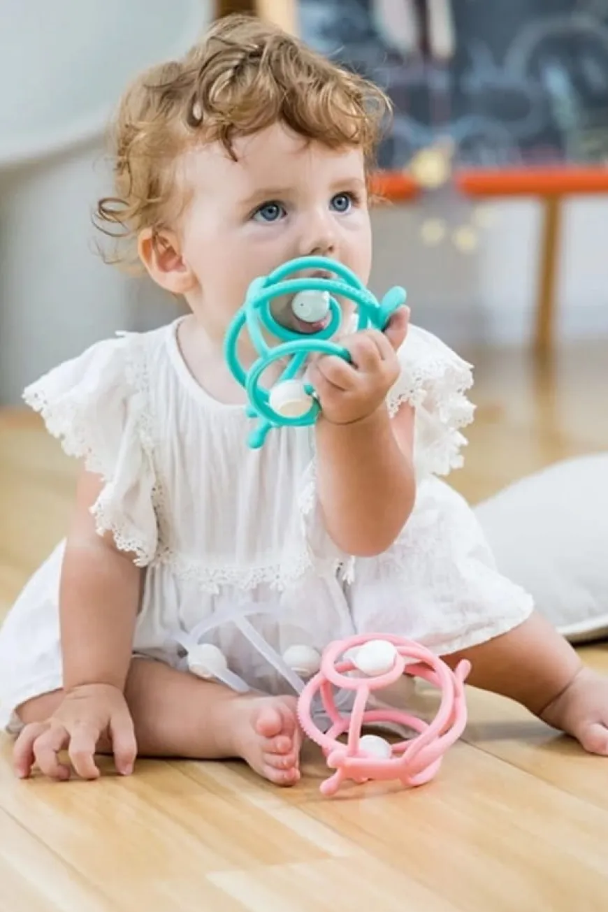 Gryzak silikonowy z grzechotką ślimak teal | Mombella 00604