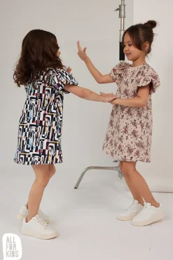 Sukienka w kwiatki z bufiastymi rękawami - All for Kids
